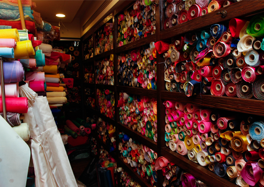 Park’s workshop is filled with various fabrics, earning it the nickname “the silk storage.